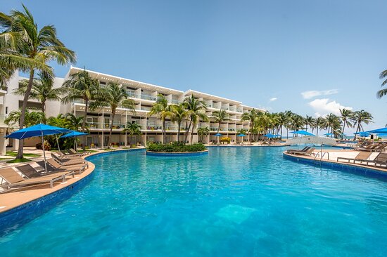 Azul Beach Resort Riviera Cancun beachfront all-inclusive resort with pools, palm trees, and white sand beach on the Riviera Maya.