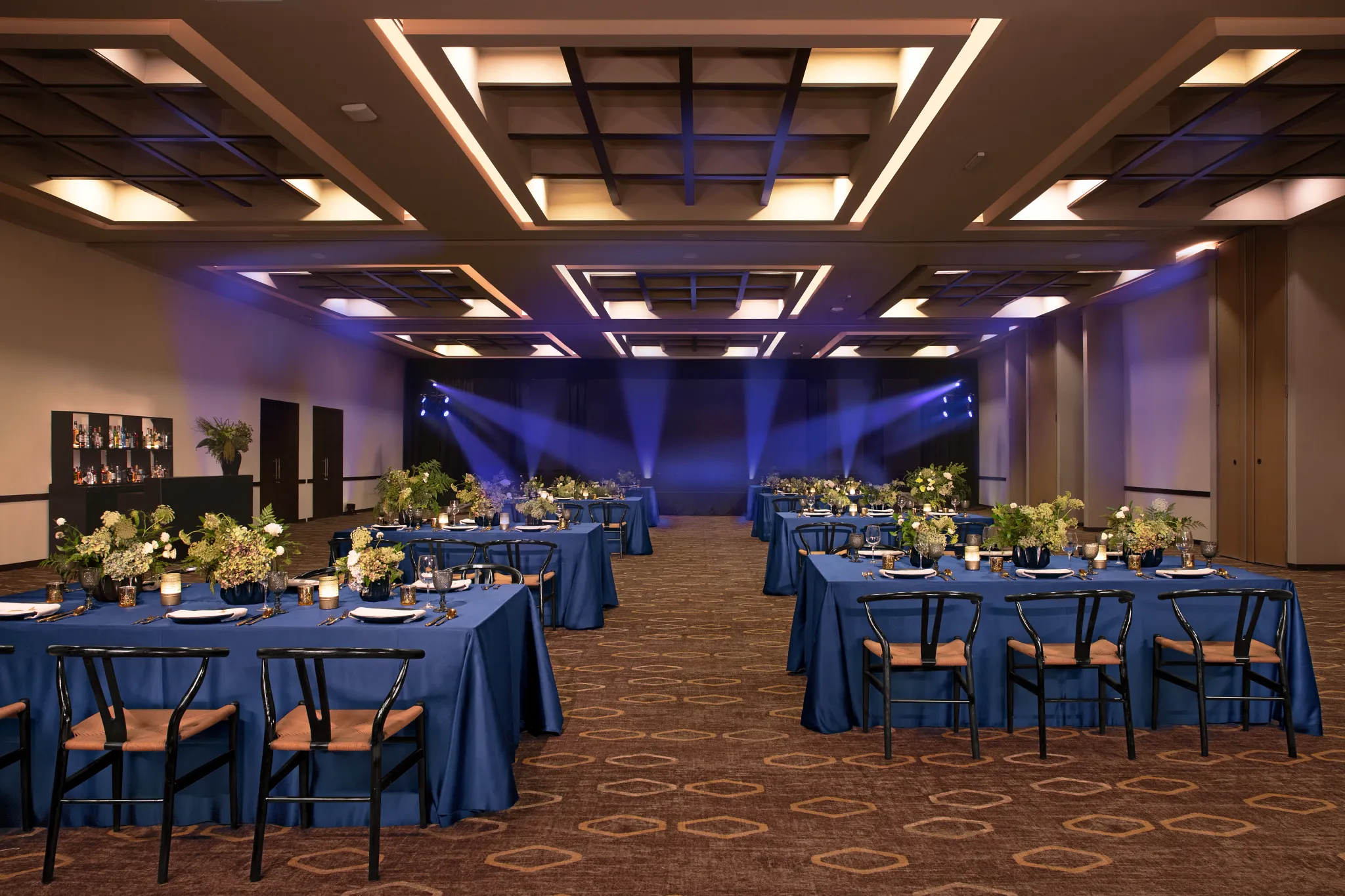 Ballroom banquet setup with blue linens for events at Dreams Puerto Morelos Resort & Spa