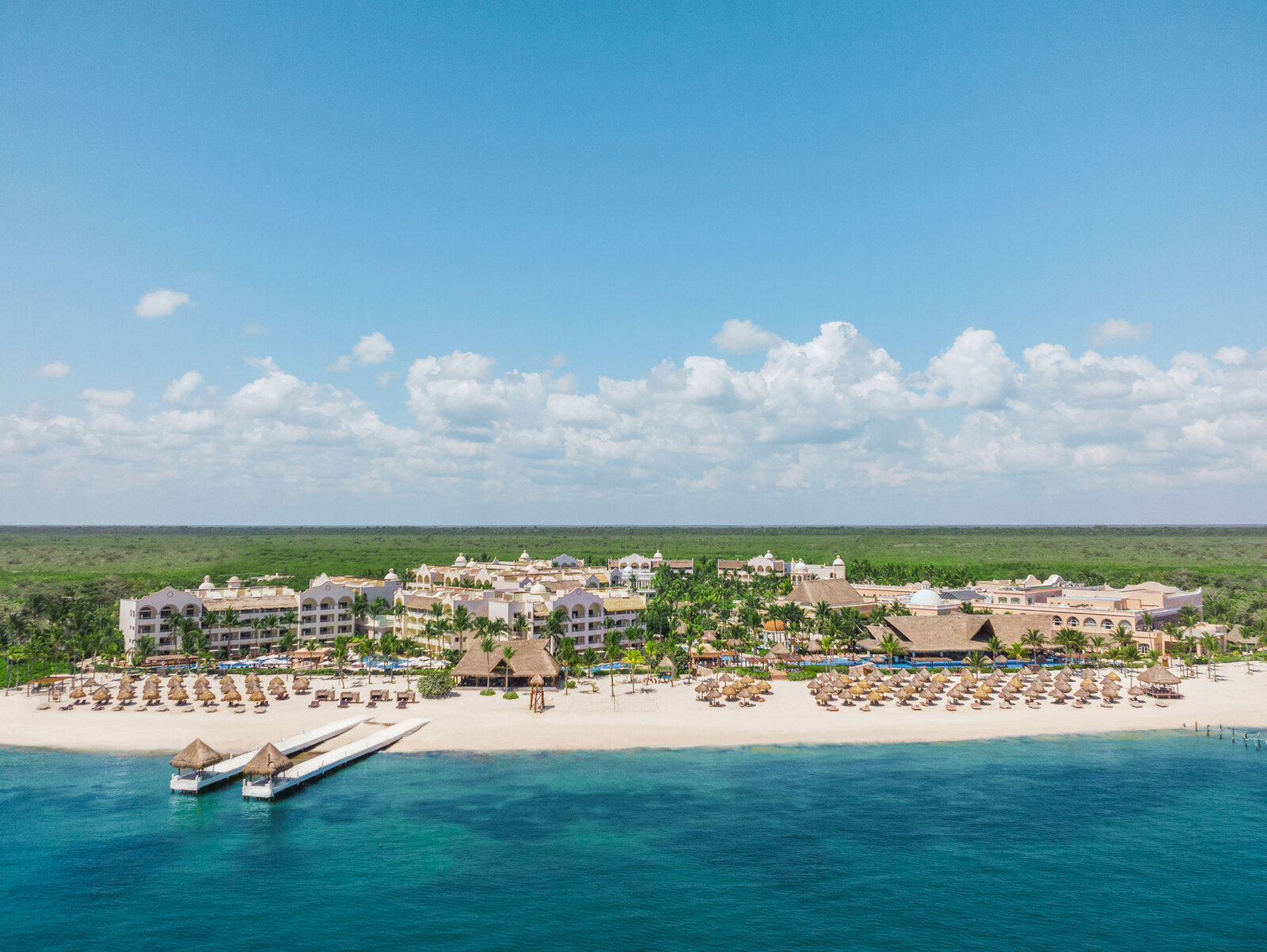 Excellence Riviera Cancun adults-only all-inclusive luxury resort with beachfront pools, swim-up suites, and refined dining on the Riviera Maya.