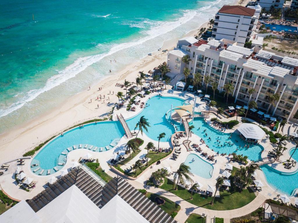 Now Sapphire Riviera Cancun all-inclusive resort with beachfront pools, tropical landscaping, and family-friendly amenities on the Riviera Maya.