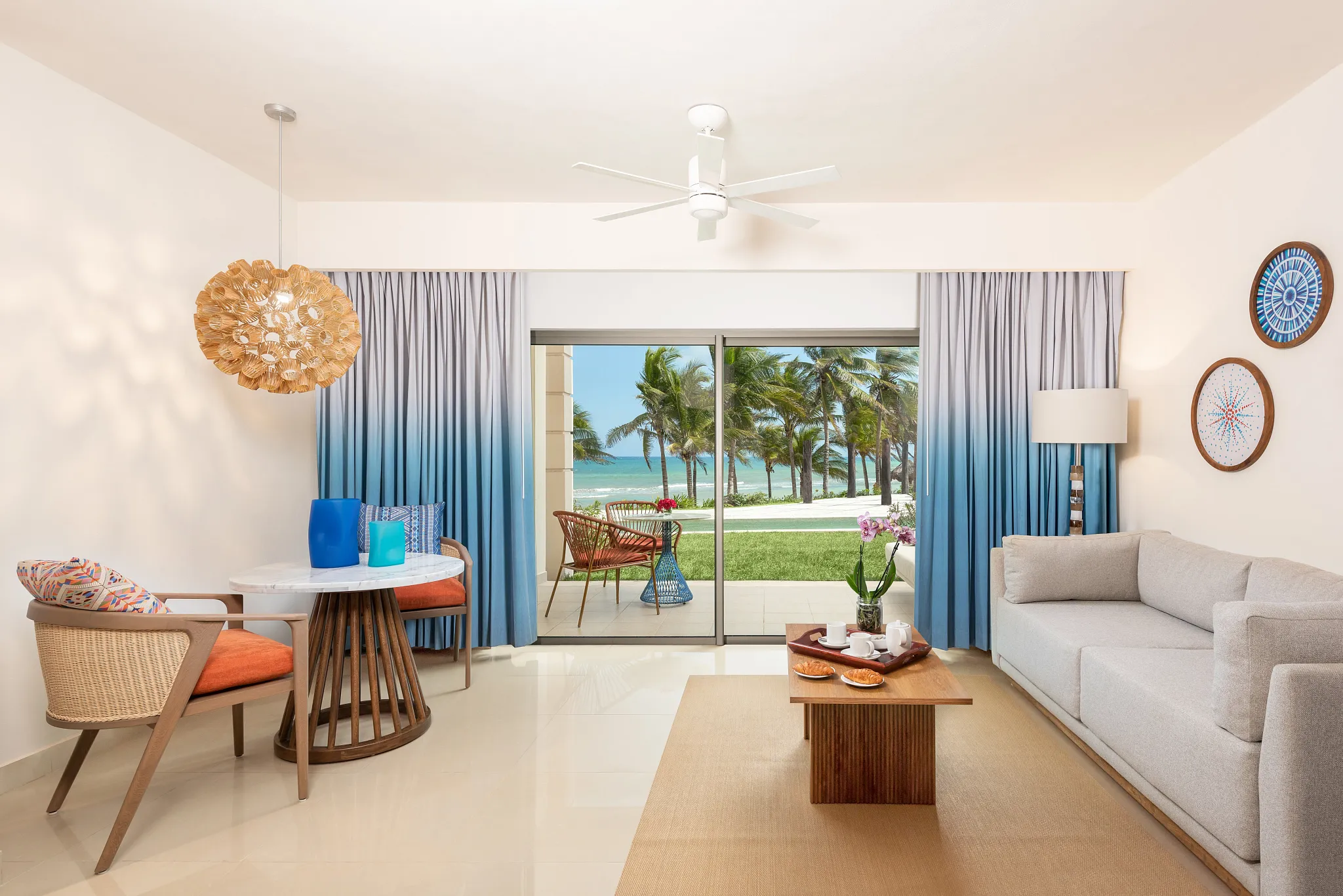 Preferred Club Junior Suite Ocean Front Double living area with terrace and ocean view at Dreams Puerto Morelos.