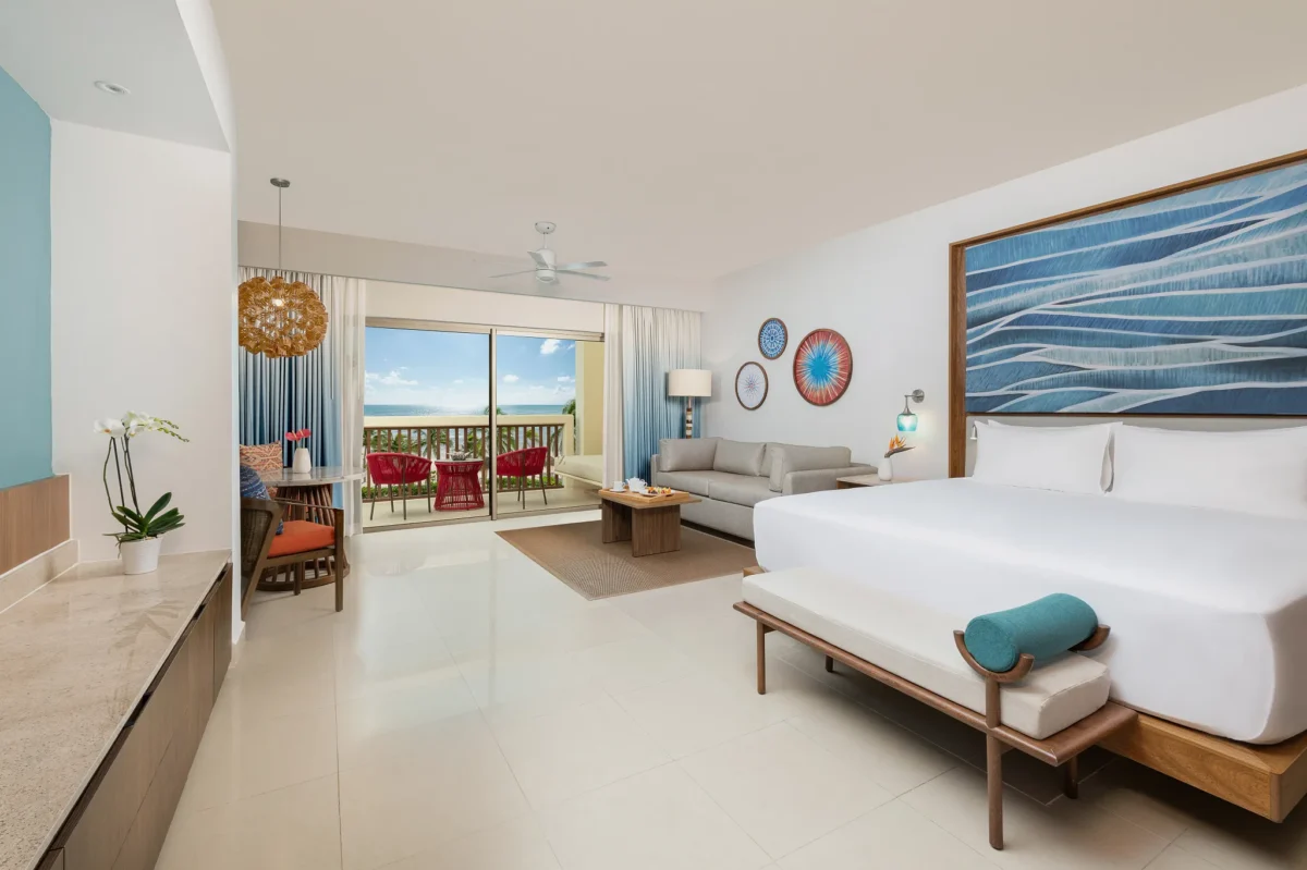 Preferred Club Junior Suite Ocean Front King with balcony and ocean views at Dreams Puerto Morelos Resort & Spa.