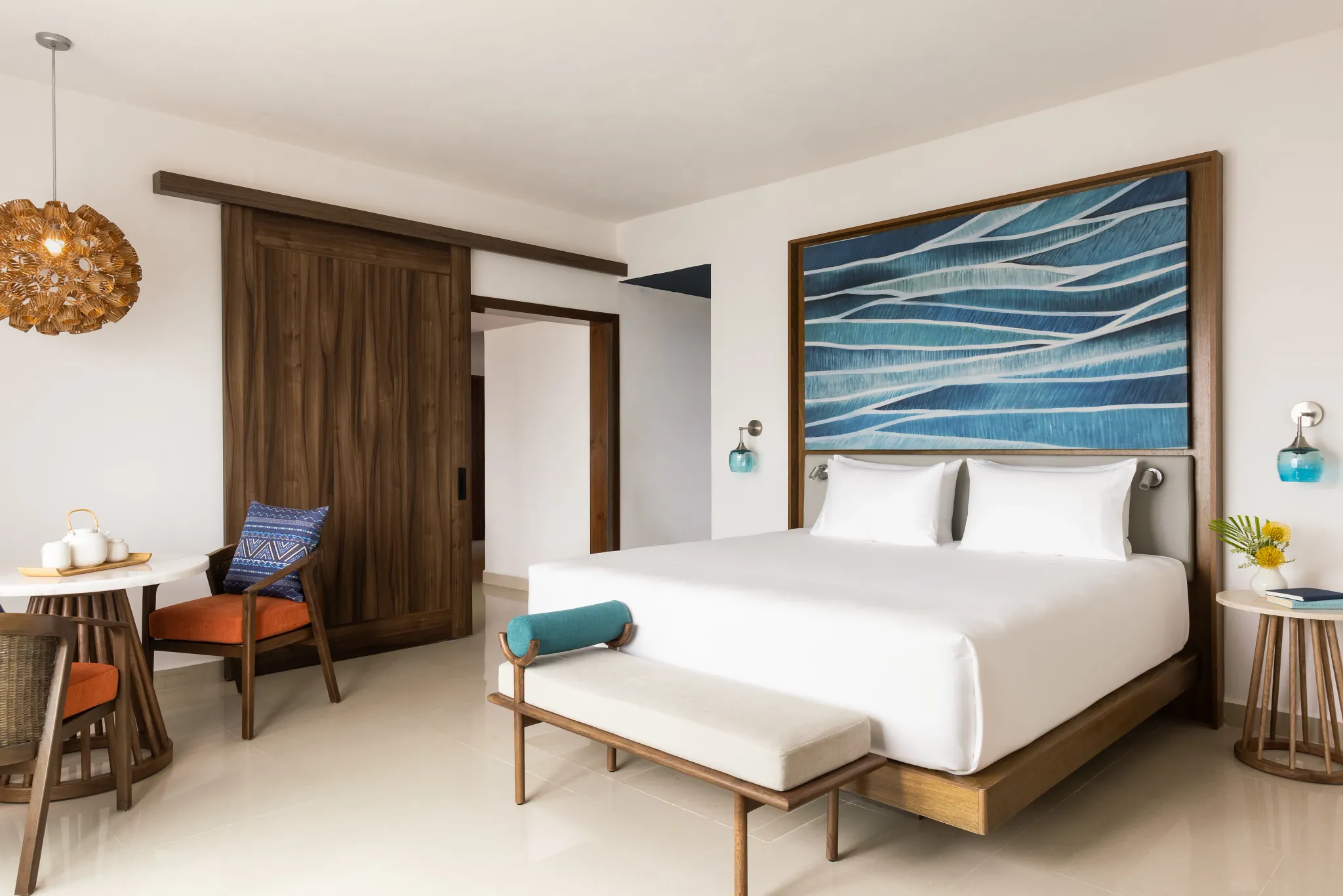 Preferred Club Master Suite Ocean Front king bedroom with modern furnishings at Dreams Puerto Morelos.