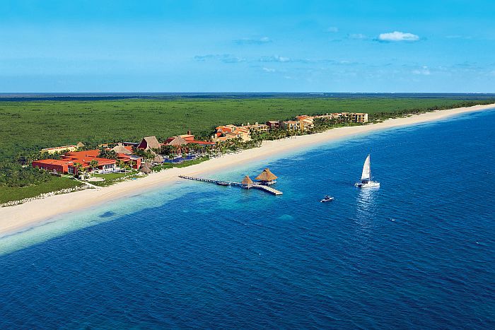 Zoëtry Paraiso de la Bonita Riviera Maya luxury boutique resort with beachfront suites, thatched roof architecture, and world-class spa.